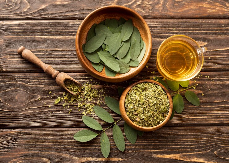 top view green leaves cup tea